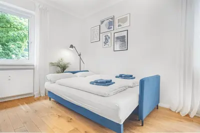 Ein Bett oder Betten in einem Zimmer der Unterkunft FeWo Phönixhütte am Baldeneysee in Kupferdreh