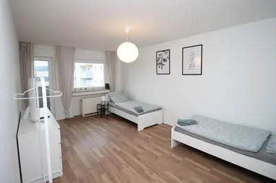 Ein Bett oder Betten in einem Zimmer der Unterkunft Cozy Apartment with Balcony