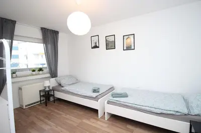 Ein Bett oder Betten in einem Zimmer der Unterkunft Cozy Apartment with Balcony