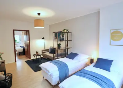 Ein Bett oder Betten in einem Zimmer der Unterkunft SAPPHIRE APARTMENT: FREE PARKING + NETFLIX + BATHTUB