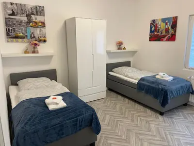 Ein Bett oder Betten in einem Zimmer der Unterkunft Apartment am Grünen Ring