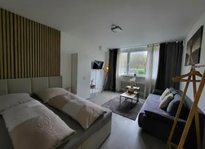Ein Bett oder Betten in einem Zimmer der Unterkunft Stilvolle Wohnung in Wuppertal inkl. Kaffee & Tee
