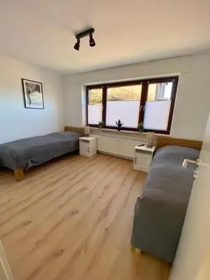 Ein Bett oder Betten in einem Zimmer der Unterkunft Voshaldsfeld27