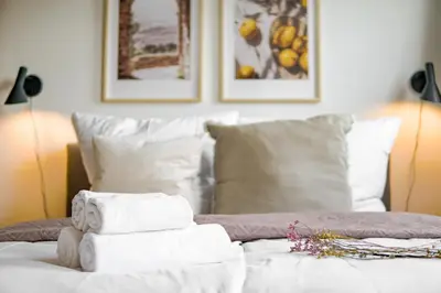 Ein Bett oder Betten in einem Zimmer der Unterkunft HOMEFY - Studio Sky
