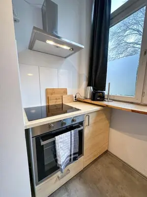 Küche/Küchenzeile in der Unterkunft Modern City apt. -with 2 TV, Netflix and work desk