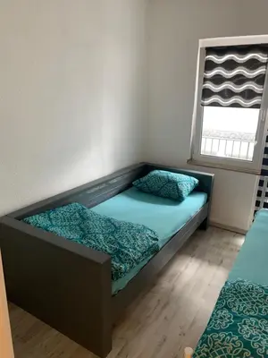 Ein Bett oder Betten in einem Zimmer der Unterkunft Unterkunft Mara