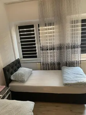 Ein Bett oder Betten in einem Zimmer der Unterkunft Unterkunft Mara
