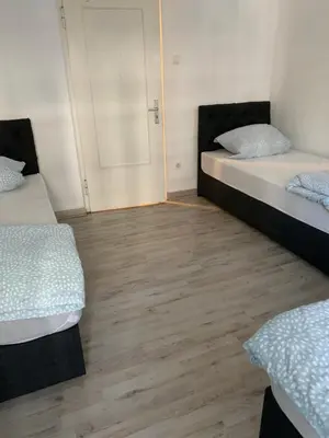 Ein Bett oder Betten in einem Zimmer der Unterkunft Unterkunft Mara