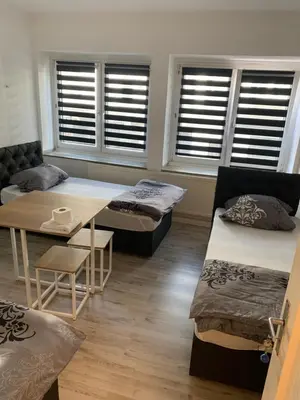 Ein Bett oder Betten in einem Zimmer der Unterkunft Unterkunft Mara
