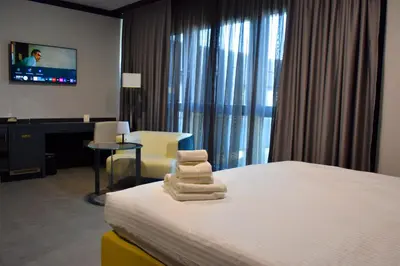 Ein Bett oder Betten in einem Zimmer der Unterkunft TIBET HOTEL am Airport Düsseldorf-Ratingen