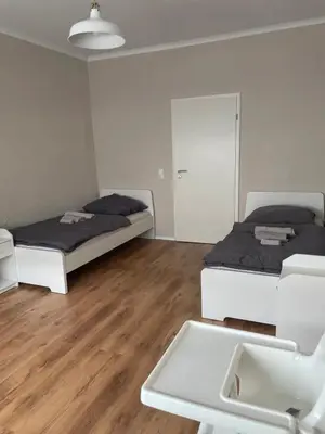 Ein Bett oder Betten in einem Zimmer der Unterkunft Gemütliche 93m² Wohlfühlfläche mit Ausblick zum Weltkulturerbe!