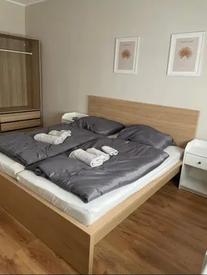 Ein Bett oder Betten in einem Zimmer der Unterkunft Gemütliche 93m² Wohlfühlfläche mit Ausblick zum Weltkulturerbe!