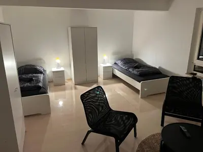 Ein Bett oder Betten in einem Zimmer der Unterkunft A&V Apartments Sweet Home