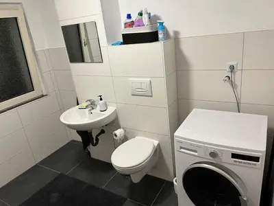 Ein Badezimmer in der Unterkunft A&V Apartments Sweet Home