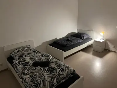 Ein Bett oder Betten in einem Zimmer der Unterkunft A&V Apartments Sweet Home