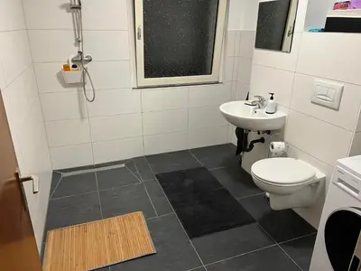 Ein Badezimmer in der Unterkunft A&V Apartments Sweet Home