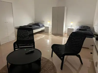 Ein Bett oder Betten in einem Zimmer der Unterkunft A&V Apartments Sweet Home