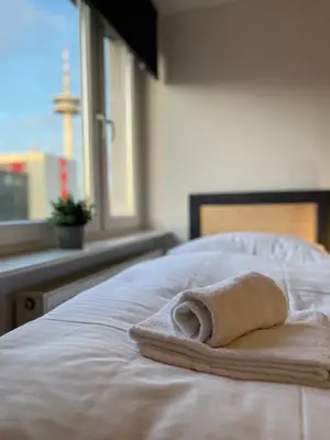 Ein Bett oder Betten in einem Zimmer der Unterkunft Sali - Apartment Essen - Comfort
