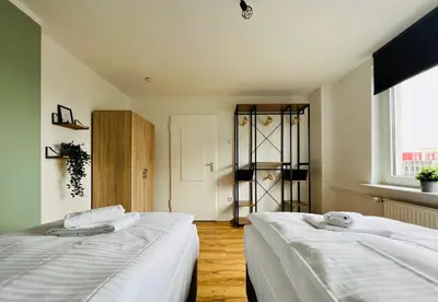 Ein Bett oder Betten in einem Zimmer der Unterkunft Sali - Apartment Essen - Comfort