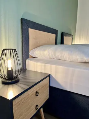 Ein Bett oder Betten in einem Zimmer der Unterkunft Sali - Apartment Essen - Comfort