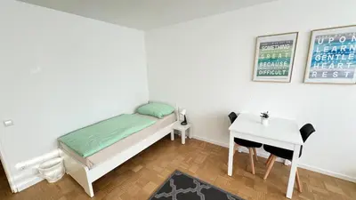 Ein Bett oder Betten in einem Zimmer der Unterkunft Monteur & Messezimmer Ratingen-Duesseldorf