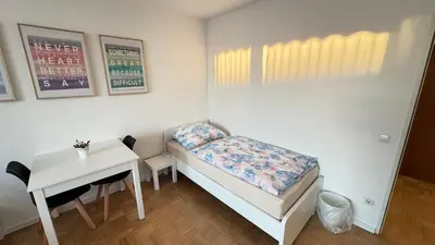 Ein Bett oder Betten in einem Zimmer der Unterkunft Monteur & Messezimmer Ratingen-Duesseldorf