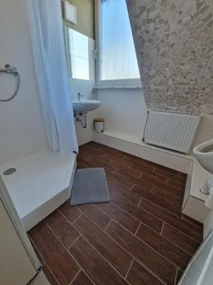 Ein Badezimmer in der Unterkunft Pension Moers am Geleucht