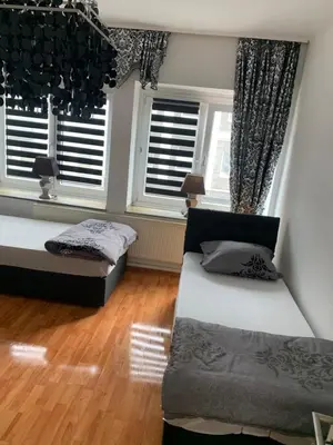 Ein Bett oder Betten in einem Zimmer der Unterkunft Unterkunft Ferienwohnung Mara Oberhausen