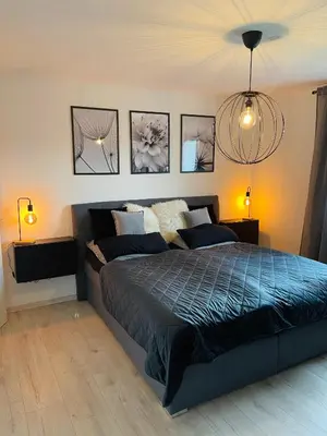 Ein Bett oder Betten in einem Zimmer der Unterkunft Ferienwohnung am Hengsteysee