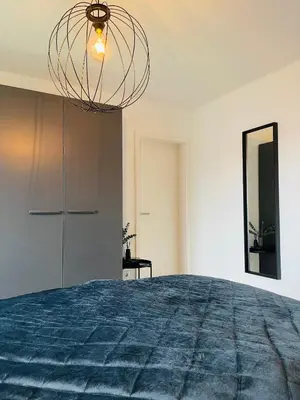 Ein Bett oder Betten in einem Zimmer der Unterkunft Ferienwohnung am Hengsteysee
