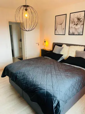 Ein Bett oder Betten in einem Zimmer der Unterkunft Ferienwohnung am Hengsteysee