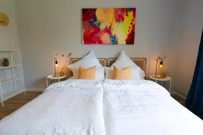 Ein Bett oder Betten in einem Zimmer der Unterkunft BetterBeds Gelsenkirchen