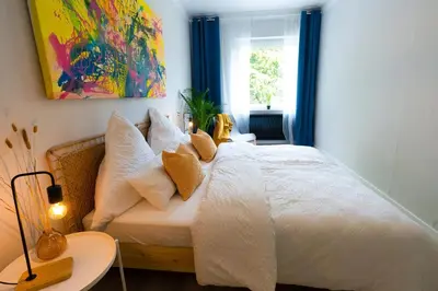 Ein Bett oder Betten in einem Zimmer der Unterkunft BetterBeds Gelsenkirchen