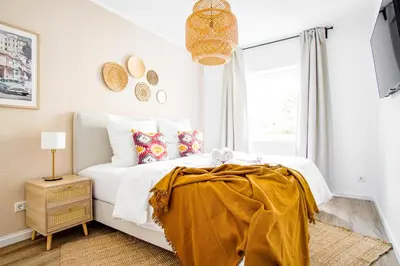 Ein Bett oder Betten in einem Zimmer der Unterkunft HOMEFY - Come Together Apartment