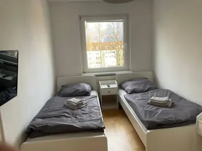 Ein Bett oder Betten in einem Zimmer der Unterkunft Ruhig und zentral wohnen! MA3R