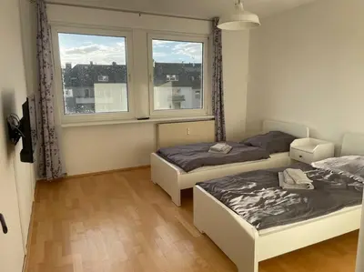 Ein Bett oder Betten in einem Zimmer der Unterkunft Ruhig und zentral wohnen! MA3R