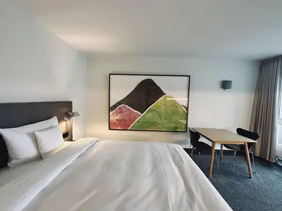 Ein Bett oder Betten in einem Zimmer der Unterkunft AvidonApartments