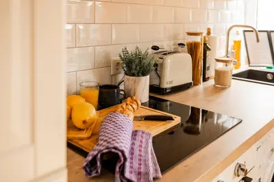 Küche/Küchenzeile in der Unterkunft Klassen Stay - Design Apartments - Zentral und 4km zur Messe