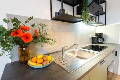 Küche/Küchenzeile in der Unterkunft BetterBeds Recklinghausen - Herten