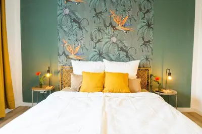Ein Bett oder Betten in einem Zimmer der Unterkunft BetterBeds Recklinghausen - Herten