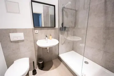 Ein Badezimmer in der Unterkunft BetterBeds Recklinghausen - Herten