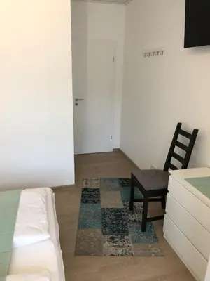 Ein Bett oder Betten in einem Zimmer der Unterkunft Ferienwohnung Ostendorf