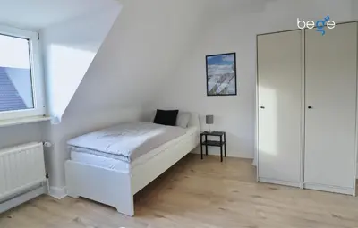 Ein Bett oder Betten in einem Zimmer der Unterkunft BEGE APARTMENTS Corporate Stay