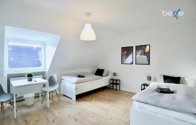 Ein Bett oder Betten in einem Zimmer der Unterkunft BEGE APARTMENTS Corporate Stay