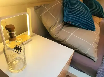 Ein Bett oder Betten in einem Zimmer der Unterkunft Modernes und ruhiges Appartement mit Loggia