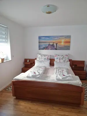 Ein Bett oder Betten in einem Zimmer der Unterkunft Hochwertige 85qm-Wohnung in Wuppertal-Vohwinkel