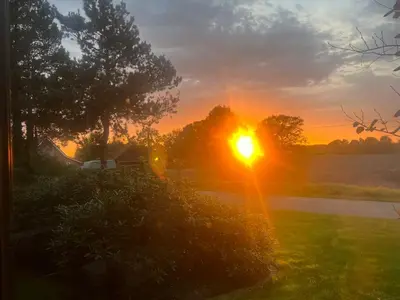 Blick auf den Sonnenuntergang/Sonnenaufgang von der Ferienwohnung aus oder aus der Nähe