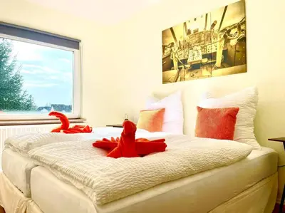 Ein Bett oder Betten in einem Zimmer der Unterkunft Zuhause im Ruhrgebiet