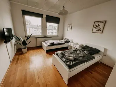 Ein Bett oder Betten in einem Zimmer der Unterkunft Zentral, ruhig, Messe Universitätsklinikum nah! MA3L