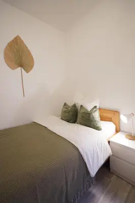 Ein Bett oder Betten in einem Zimmer der Unterkunft Dein Flughafen Messe Apartment nahe Düsseldorf 2